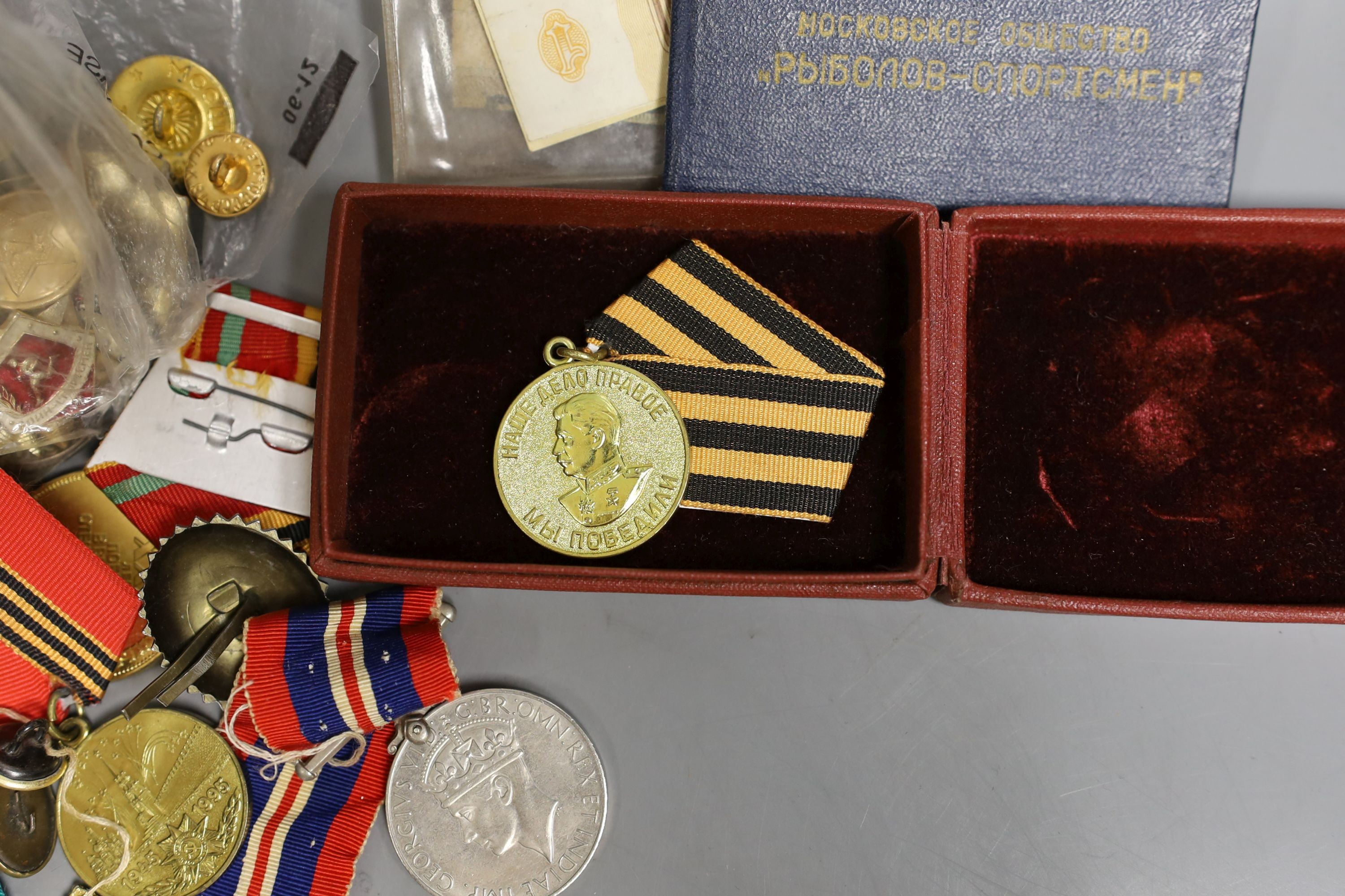 Three pairs of Polish Army shoulders pads, four U.S.S.R, Jubilee Medals, buttons, brooches and WWI medal group to Pte. G. Huggett, Royal Sussex Regiment, a WWII war medal and a USSR WWII 'Stalin' Medal.